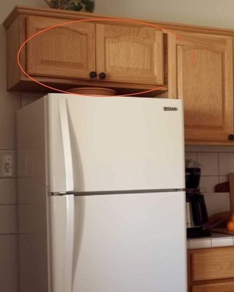 Nobody Knows The Right Way To Use That Little Cupboard Above The Fridge